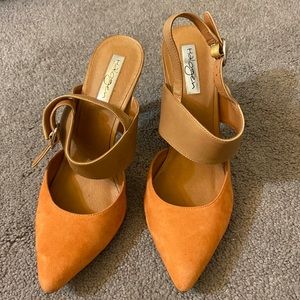 Orange and tan sling back pumps